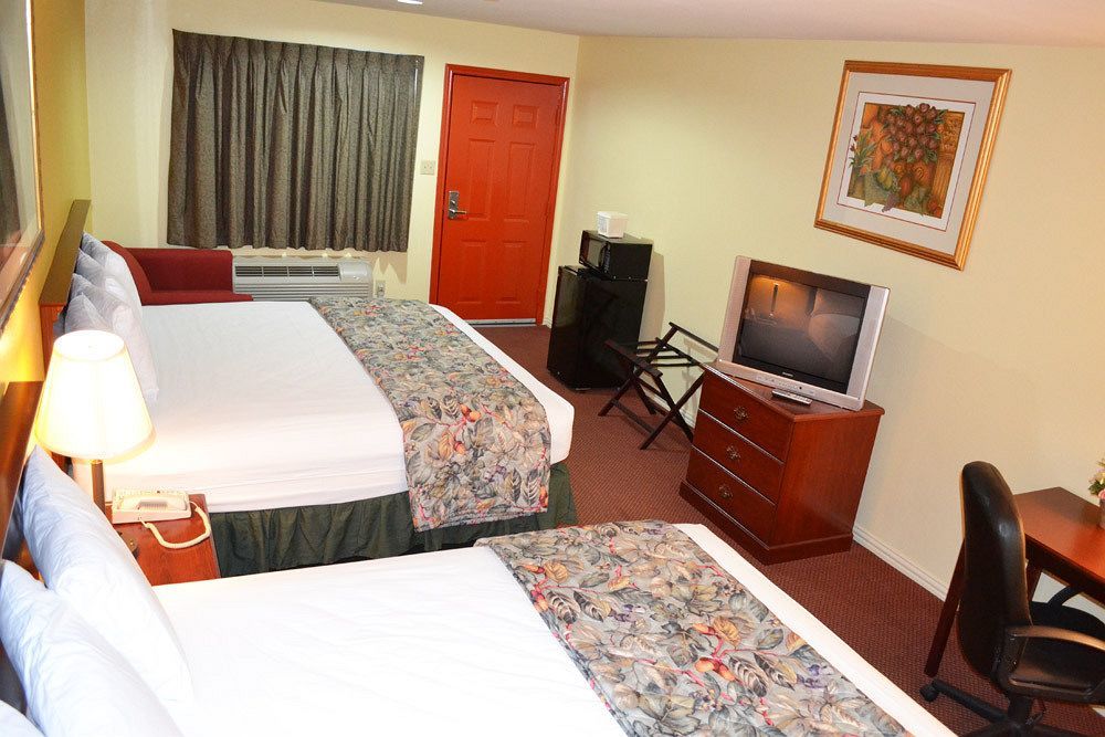 Executive Inn&Suites Magnolia Extérieur photo